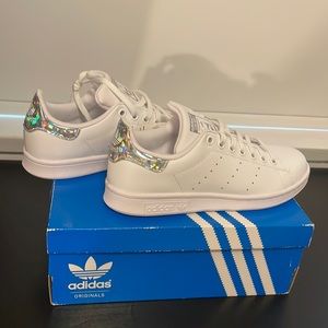 Brand new Woman Adidas shoes. Size 6